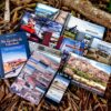 coleção de livros e guias de cicloturismo