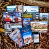 coleção de livros e guias de cicloturismo